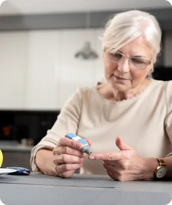 Senior woman recording vitals for RPM